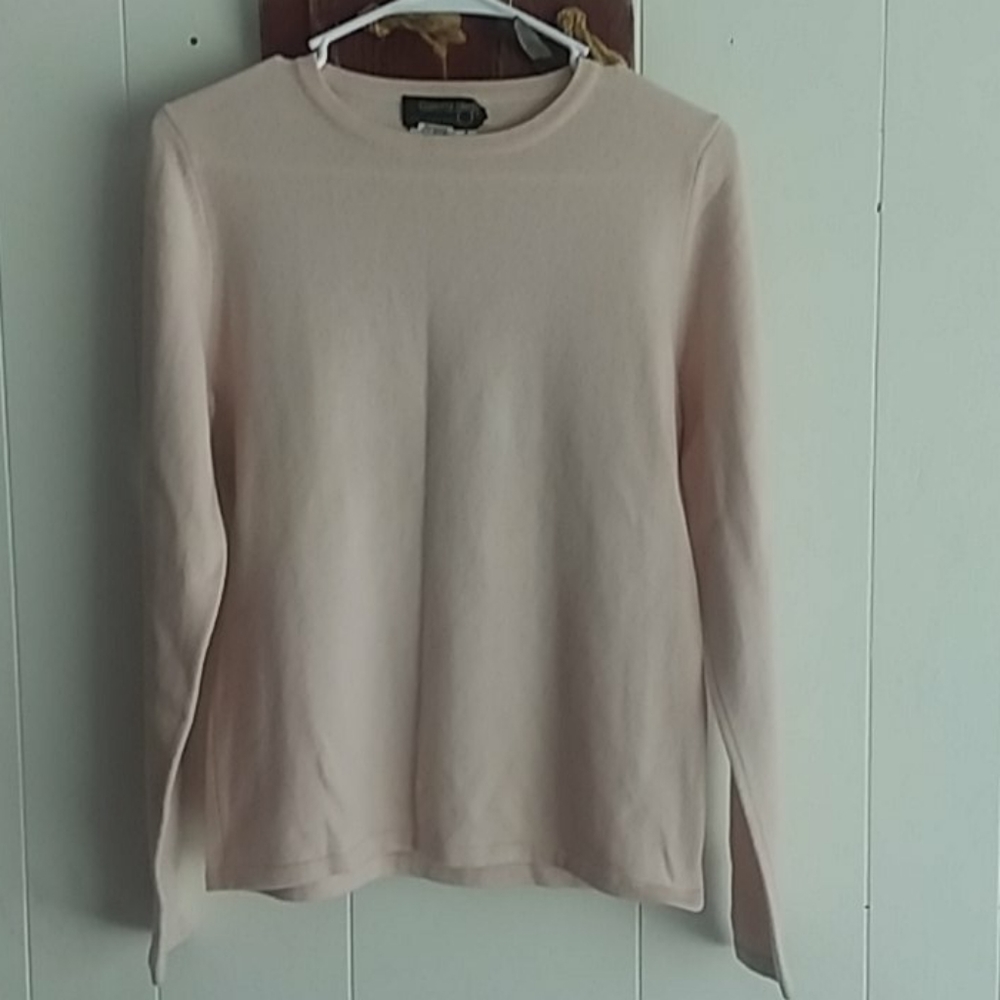 Pale pink cashmere sweater.
